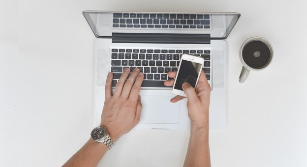 Laptop and smartphone reporting technology.